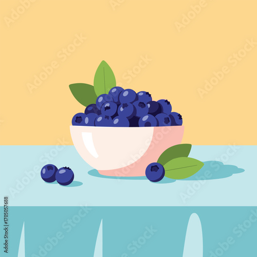 A bowl of fresh blueberries sits on a table with a few blueberries scattered around.