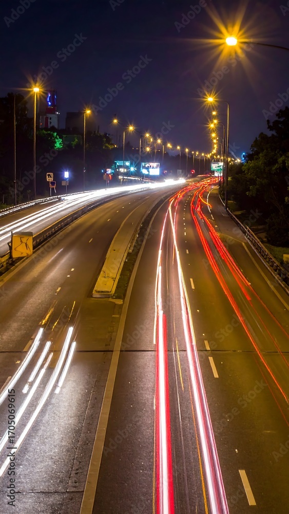 Obraz premium Night highway traffic trails