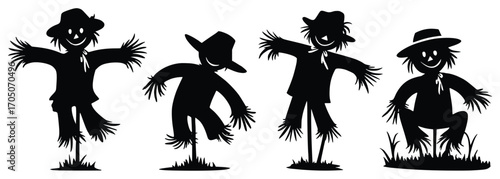 Autumn Silhouette: Four whimsical scarecrows standing in a row, their silhouette against a vibrant backdrop, a picture of harvest season's cheerful spirit.