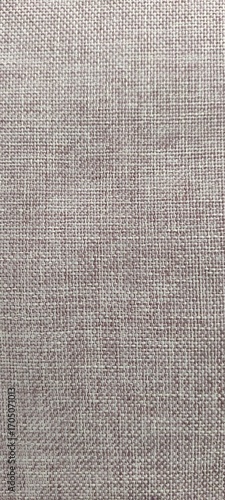 Textured Brown Fabric Close-Up Showcasing Woven Patterns and Subtle Variations in Hue During Daylight