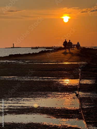 sunset walk on the breakwater