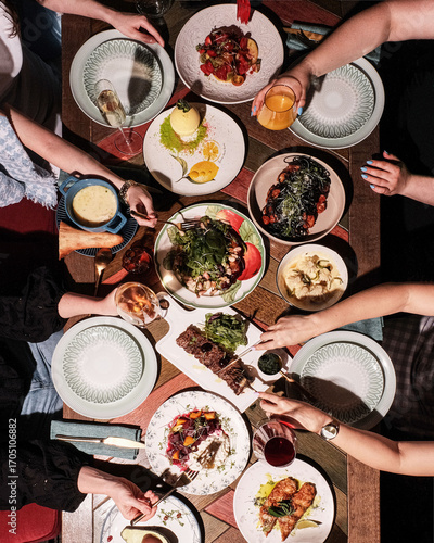 A Delicious Feast Shared Among Friends Gathered Around a Vibrant