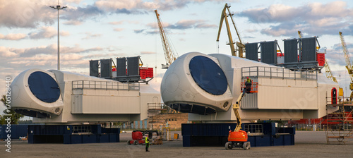 Wind turbine components during the assembly of a complete wind turbine nacelle