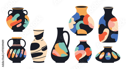 A collection of various abstract art ceramic vases with colorful organic shapes