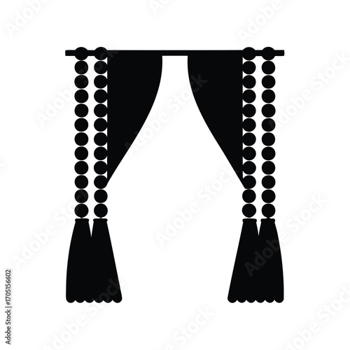 Elegant black curtain with bead fringe and decorative tassels in a minimal design