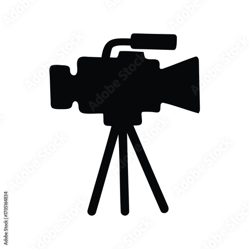 Silhouette of a professional video camera mounted on a tripod stand
