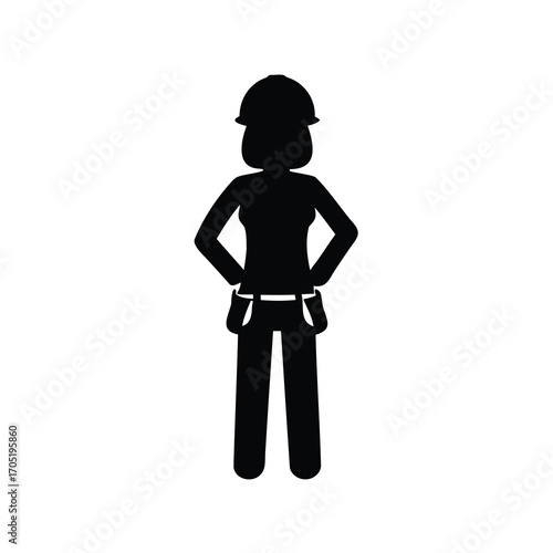 Silhouette of a female construction worker with hands on hips posing