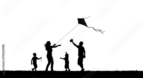 Silhouetted family enjoys a day of kite flying against a pristine sky backdrop