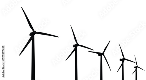 Row of wind turbines against a bright white background silhouette