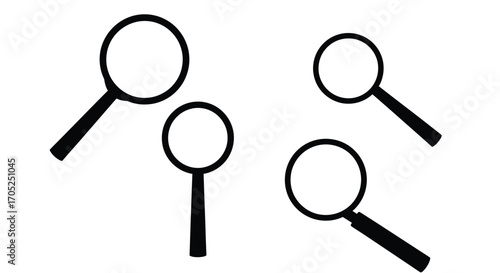 Four magnifying glass silhouettes on a white background