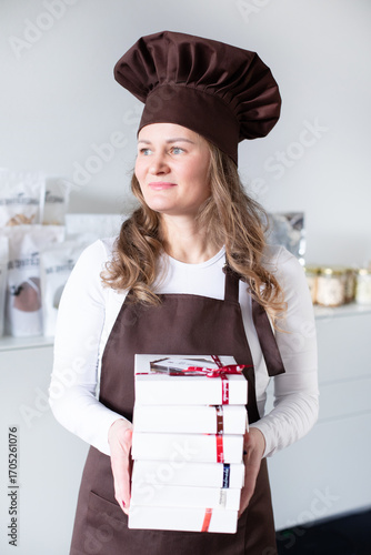 Chocolatier with homemade handmade boxes of chocolate