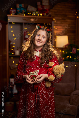 Smiling Girl in Red Dress with Christmas Decor