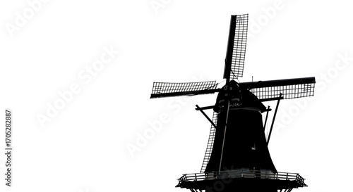 Dramatic silhouette of a traditional windmill against a pristine white backdrop evokes rustic