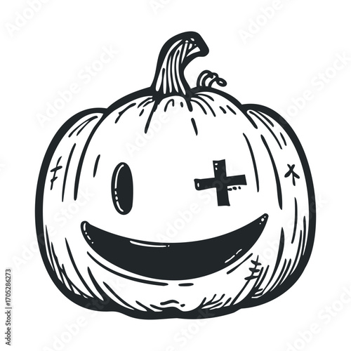 A spooky carved pumpkin with a glowing face in the dark.