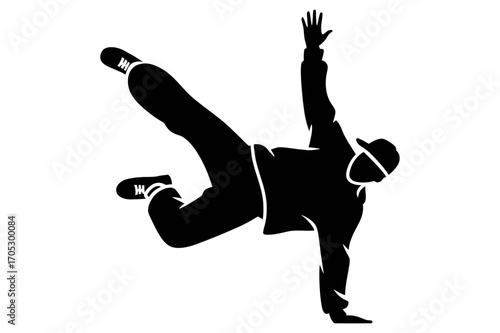 Silhouette of a breakdancer performing a freeze with one hand and one leg in the air pose