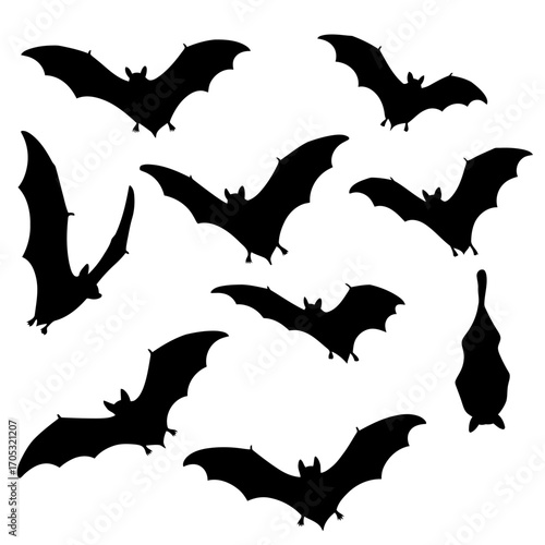 A vector illustration set of black flying bat silhouettes