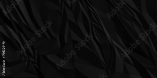 Black crumpled recycled craft paper texture background. Abstract shape background with space paper for text. Minimal wrinkled rough canvas paper texture.	