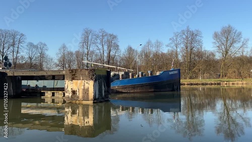  A barge on a water canal near the city of Herstel in Germany