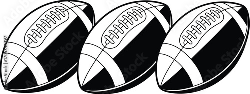 Three black and white rugby balls lined up in a row