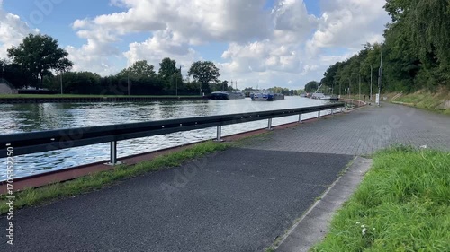A barge on a water canal near the city of Herstel in Germany