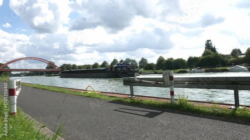 A barge on a water canal near the city of Herstel in Germany