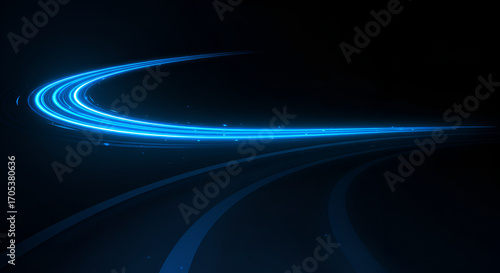 Abstract blue light trails on a dark background for futuristic concepts