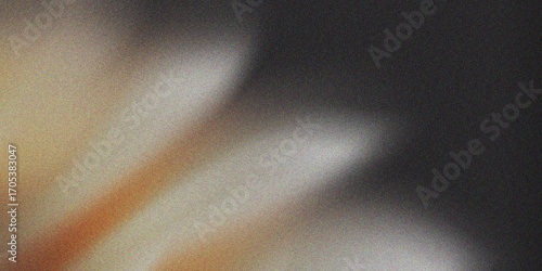 Minimal glowing blur with warm orange and cream tones on black backdrop, abstract gradient wallpaper with textured noise effect
