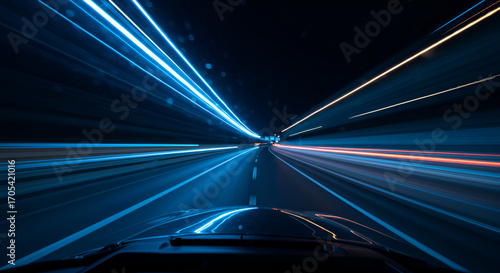 Night driving: Long exposure shot capturing motion and energy on the road