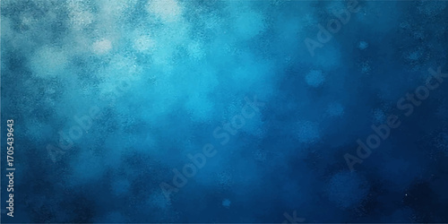An abstract blue grunge background with a dark, smoky texture and bright, winter snowflake particles