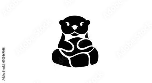 Simple black silhouette of a cute otter holding a stone.