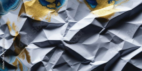 Abstract close up of crinkled paper with yellow and blue tints