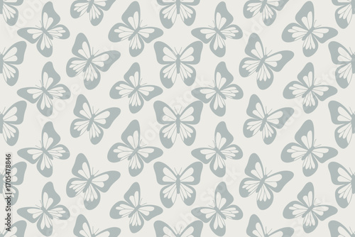 A repeating pattern of light gray butterflies on a cream colored background with a simple design style