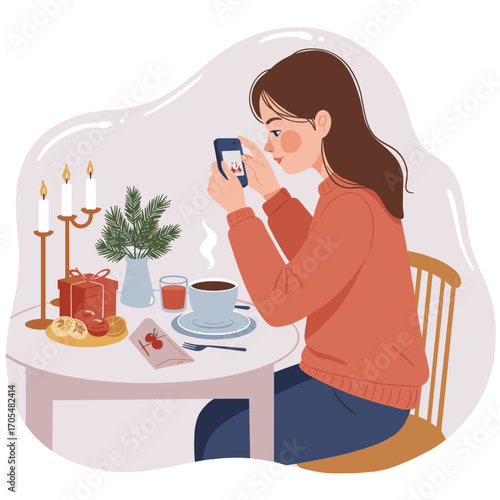 Woman taking a photo with smartphone while sitting at table  