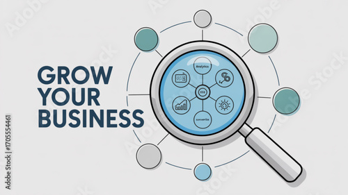 Magnifying glass with business icons representing growth, strategy, analysis, and development concept