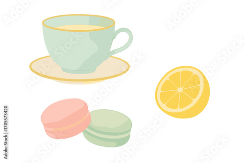 Elegant teacup with saucer, fresh lemon slice, and colorful macarons for a delightful afternoon tea time