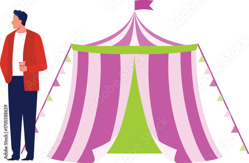 boy is standing outside of a tent
