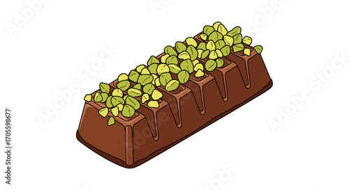 Chocolate bar with pistachios on top.