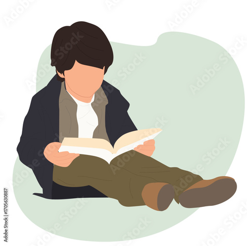 boy reading a book. Cute little smart boy sitting and reading book
