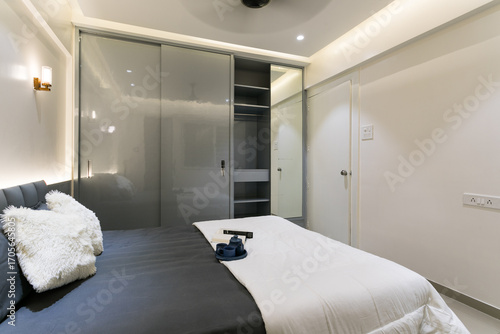 Modern Indian Bedroom Interior in Grey Laminate Finish with Copy Space