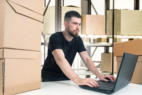 Warehouse management. Man i...