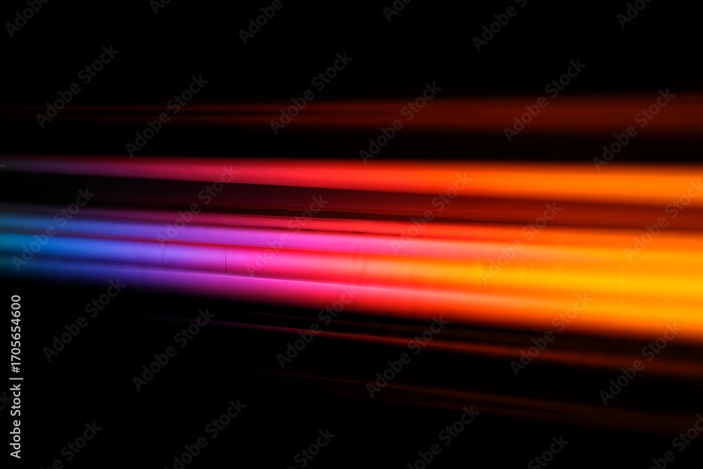 Naklejka premium Abstract colorful light trails on a black background with dynamic movement