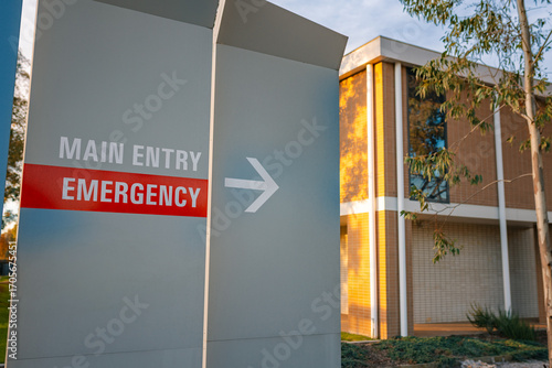 Signage leading to hospital emergency department entrance