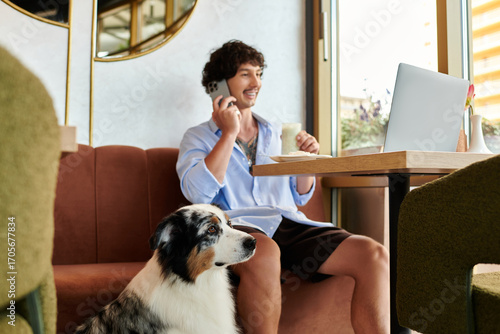 Joyful moments of a young man enjoying a cafe visit with his dog