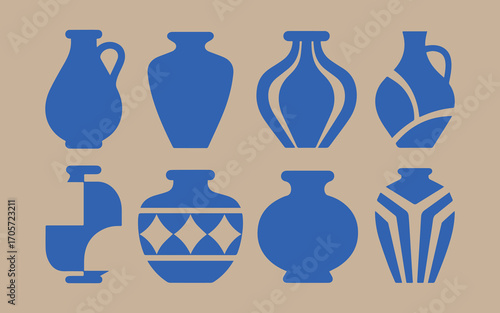 Collection of eight blue ceramic vases and pottery on a beige background