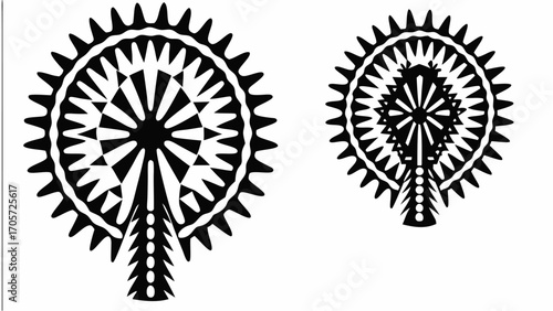 Two abstract black and white floral designs with spiky petals and geometric center patterns displayed silhouette