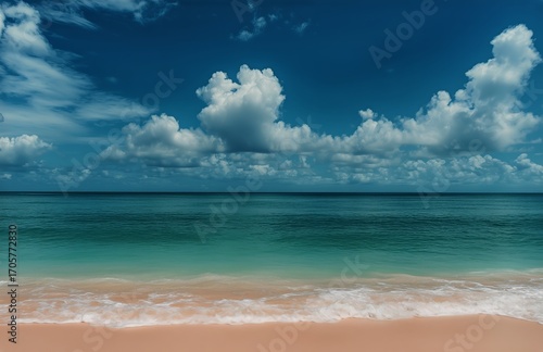 Beautiful Sandy Beach With Turquoise Water and Clouds on a Sunny Day.