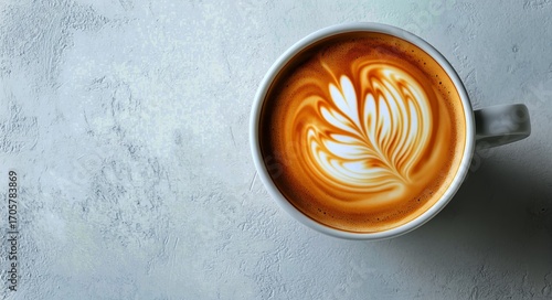 Barista Creates Intricate Latte Art in a Coffee Cup on a Grey Background.