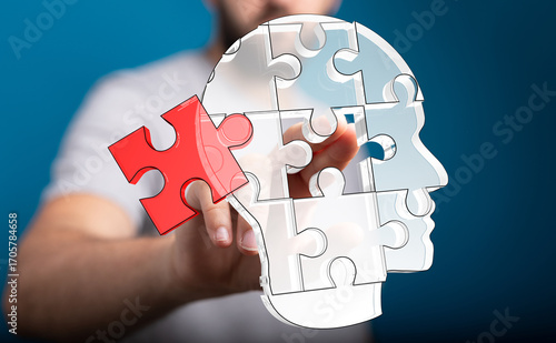 Person connecting puzzle pi...