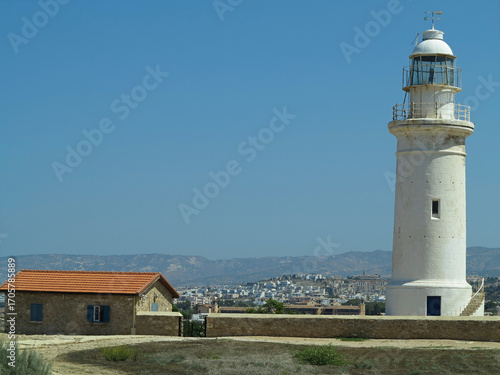 Old white lighthouse near Paphos city Cyprus