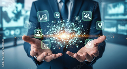 Digital marketing and information about customers. Businessperson holding network structure and customer icons.